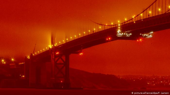 Golden Gate bridge orange glow from forest fires
